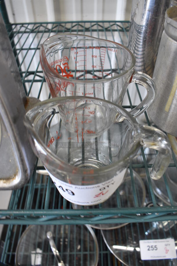 2 Glass Measuring Cups. 5x3.5x4, 6x4.5x4.5. 2 Times Your Bid! - Image 2 of 3