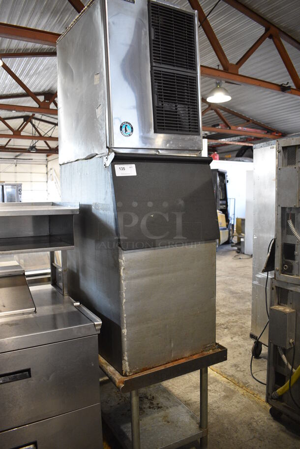 Hoshizaki Model KM-500MAH Stainless Steel Commercial Ice Machine Head on Metal Commercial Ice Bin and Equipment Stand. 115-120 Volts, 1 Phase. 23x33x71, 37x24x25 - Image 1 of 8