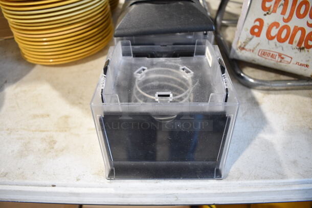 7 Black and Clear Poly Napkin Dispensers. 1 Missing Top. 6x6x6. 7 Times Your Bid! - Image 3 of 3