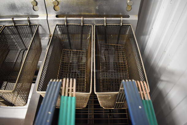 2012 Pitco Frialator SG14 Stainless Steel Commercial 2 Bay Natural Gas Powered Deep Fat Fryer w/ 4 Metal Fry Baskets on Commercial Casters. 110,000 BTU. 31.5x34x48 - Image 5 of 11