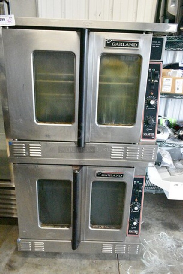 2 Garland Master 200 Stainless Steel Commercial Natural Gas Powered Full Size Convection Oven w/ View Through Door, Metal Oven Racks and Thermostatic Controls on Commercial Casters. 2 Times Your Bid! - Image 1 of 8
