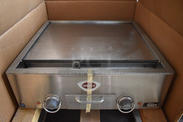 BRAND NEW IN BOX! Wells Model P513 Stainless Steel Commercial Countertop Electric Powered Flat Top Griddle. 208/240 Volts, 1 Phase. 25x24x9