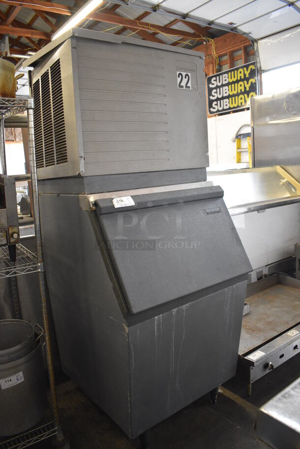 Scotsman CME506AE-1A Metal Commercial Ice Machine on Commercial Ice Bin. 115 Volts, 1 Phase. 30.5x36x77