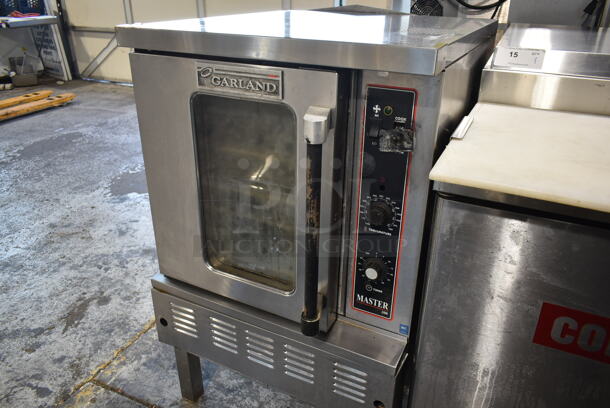 Garland MCO-E-5LE Master 200 Stainless Steel Commercial Natural Gas Powered Half Size Convection Oven w/ View Through Door, Metal Oven Racks and Thermostatic Controls on Metal Legs. - Image 2 of 8