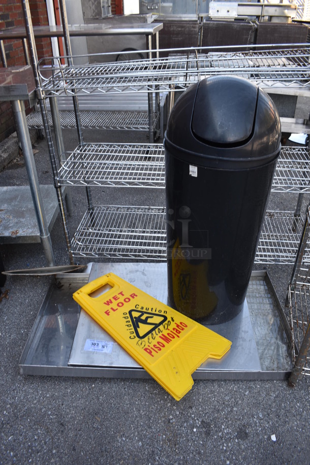 ALL ONE MONEY! Lot of Various Items Including Poly Black Trash Can, Poly Yellow Wet Floor Caution Sign and Metal Panel - Image 1 of 4