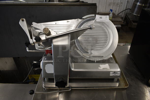 Univex 1000S Stainless Steel Commercial Countertop Meat Slicer. 115 Volts, 1 Phase. Tested and Does Not Power On