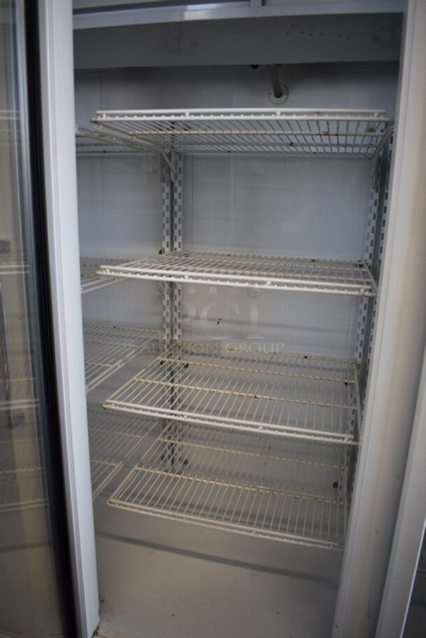 Carrier Refrigeration Pulse Model ULG808CEXT-5 Metal Commercial 3 Glass Door Reach In Cooler Merchandiser w/ Poly Coated Racks. 115/208-230 Volts, 1 Phase. 78x36x79.5. - Image 5 of 6