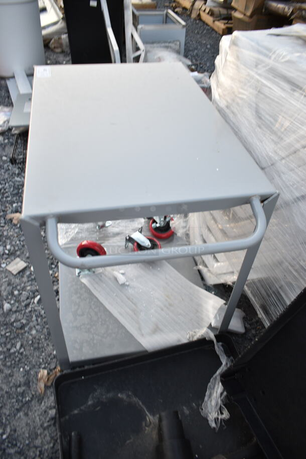 BRAND NEW SCRATCH AND DENT! Lavex Gray Metal 2 Tier Cart w/ Commercial Casters.  - Image 4 of 6