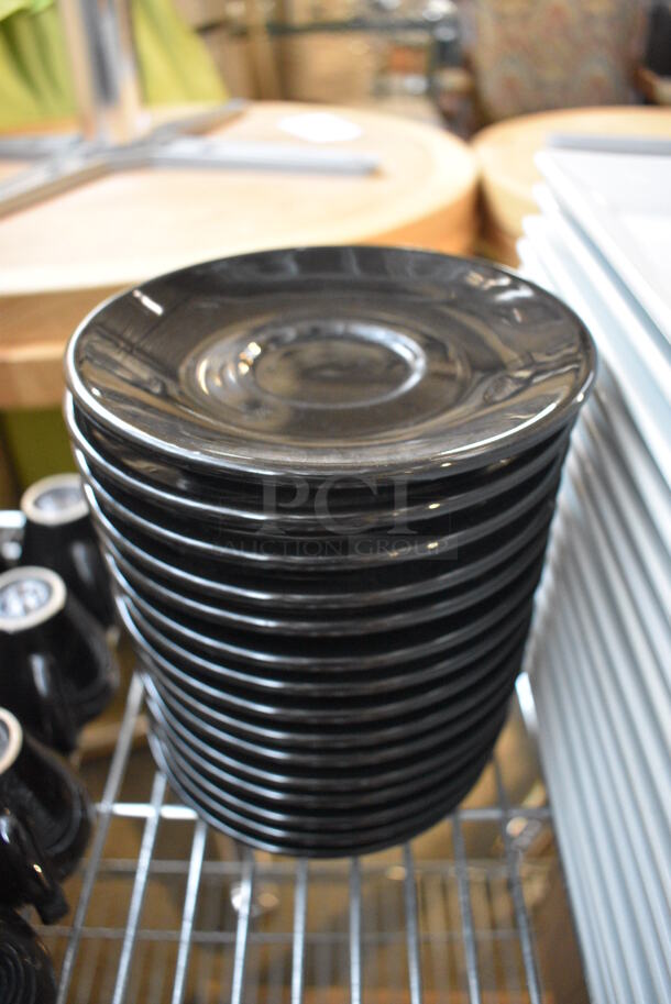 16 Black Ceramic Saucers. 5.75x5.75x1. 16 Times Your Bid! - Image 1 of 3