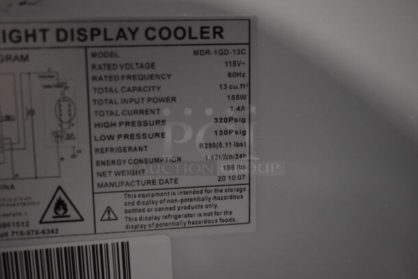 BRAND NEW SCRATCH AND DENT! KoolMore MDR-1GD-13C Metal Commercial Single Door Reach In Cooler Merchandiser w/ Poly Coated Racks on Commercial Casters. 115 Volts, 1 Phase. Tested and Working! - Image 8 of 9
