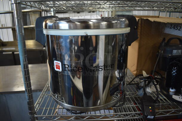 BRAND NEW SCRATCH AND DENT! Town 56919 Stainless Steel Commercial Countertop 92 Cup Rice Warmer. 120 Volts, 1 Phase. 18x16x16. Tested and Working!