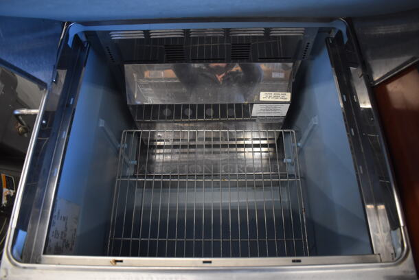 2011 Delfield 4427N-12M Stainless Steel Commercial Sandwich Salad Prep Table Bain Marie Mega Top on Commercial Casters. 115 Volts, 1 Phase. 27.5x33x45. Tested and Powers On But Temps at 50 Degrees - Image 4 of 6