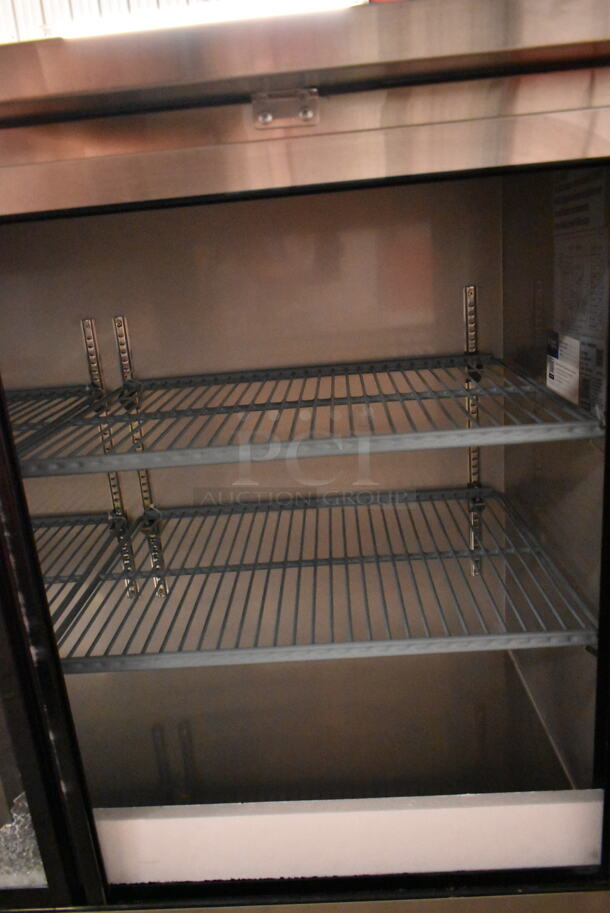 BRAND NEW SCRATCH AND DENT! Avantco 178UBB60SHCS 60" Stainless Steel Counter Height Narrow Sliding Glass Door Back Bar Refrigerator with LED Lighting. See Pictures for Broken Door Glass. 115 Volts, 1 Phase. Tested and Working! - Image 5 of 7