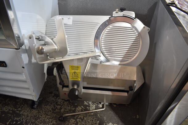 BRAND NEW SCRATCH AND DENT! Estella 348SLA13 Stainless Steel Commercial Countertop Automatic Meat Slicer w/ Blade Sharpener. 120 Volts, 1 Phase. Tested and Powers On But Parts Do Not Move
 - Image 2 of 8