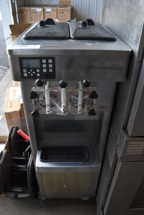 2011 Stoelting Model F231-109I2-YG2 Stainless Steel Commercial Floor Style Water Cooled Soft Serve Ice Cream Machine on Commercial Casters. 208-240 Volts, 3 Phase. 19x33x60