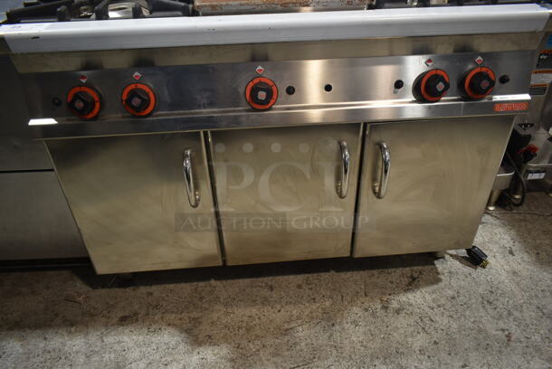Lotus Stainless Steel Commercial Gas Powered 4 Burner Range w/ Center Burner, Under Shelf and 3 Doors. - Image 3 of 6