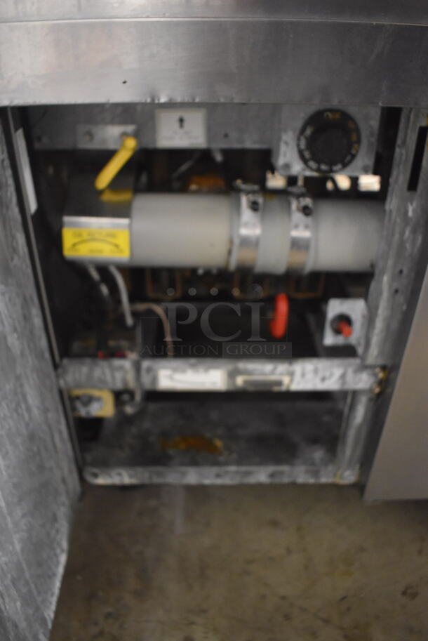 2011 Dean SCFSM350GNS Stainless Steel Commercial Floor Style Natural Gas Powered 3 Bay Deep Fat Fryer w/ 6 Metal Fry Baskets and Filtration System on Commercial Casters. 105,600 BTU. 47x30x51 - Image 10 of 11