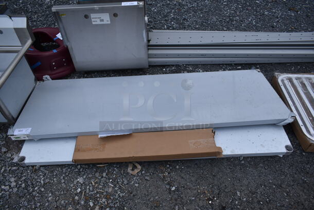 BRAND NEW SCRATCH AND DENT! Regency 600T2472G 24" x 72" 18-Gauge 304 Stainless Steel Commercial Work Table with Galvanized Legs and Undershelf  - Image 2 of 5