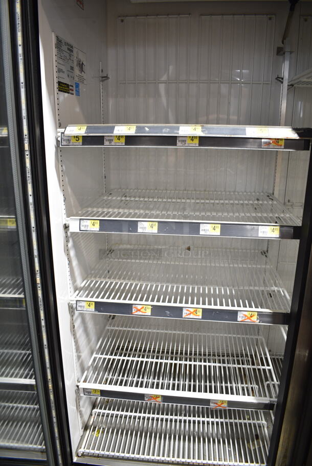 2015 True GDM-49F-LD ENERGY STAR Metal Commercial 2 Door Reach In Freezer Merchandiser w/ Poly Coated Racks on Commercial Casters. 115/208-230 Volts, 1 Phase. Tested and Working! - Image 5 of 6