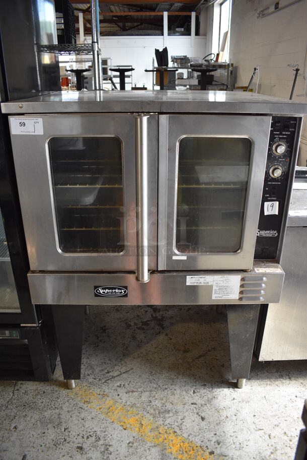 Southbend Model SLGS/12SC Stainless Steel Commercial Propane Gas Powered Full Size Convection Oven w/ View Through Doors, Metal Oven Racks and Thermostatic Controls on Metal Legs. 38x33x52