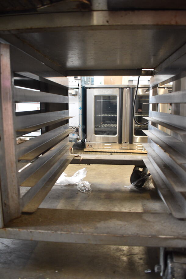 Baxter Stainless Steel Commercial Natural Gas Powered Mini Rotating Rack Oven w/ Lower Double Pan Rack on Commercial Casters. See Pictures for Broken Glass Pane.  - Image 4 of 8