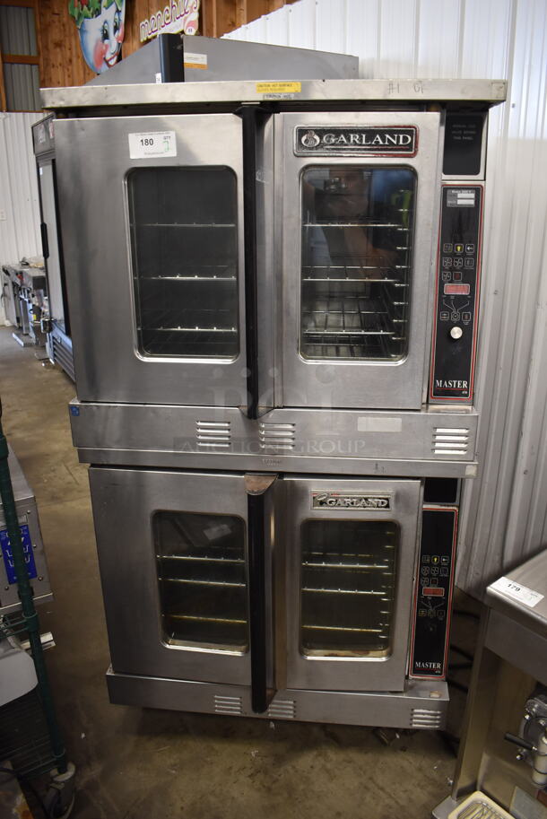2 Garland Master 450 Commercial Stainless Steel Natural Gas Powered Double Convection Oven With Steel Racks. 2 Times Your Bid!  - Image 1 of 10