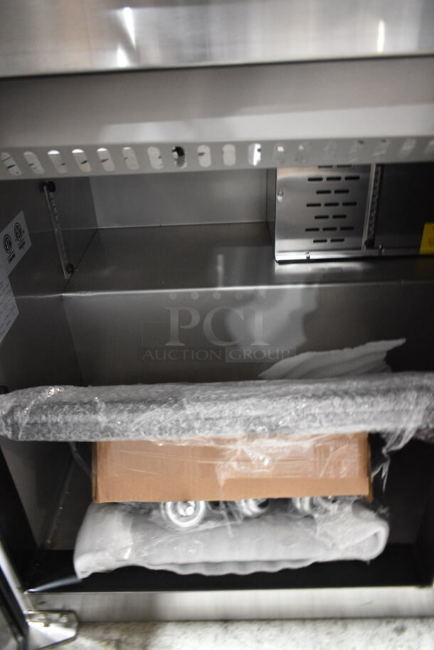 BRAND NEW SCRATCH AND DENT! 2023 Avantco 447APST72 Stainless Steel Commercial Sandwich Salad Prep Table Bain Marie Mega Top on Commercial Casters. 115 Volts, 1 Phase. Tested and Working! - Image 7 of 10