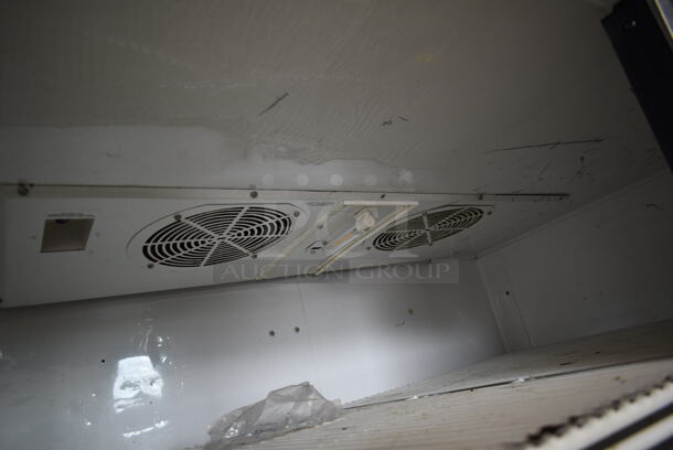 2011 True TG2R-2S ENERGY STAR Stainless Steel Commercial 2 Door Reach In Cooler w/ Poly Coated Racks on Commercial Casters. 115 Volts, 1 Phase. Tested and Working! - Image 6 of 8