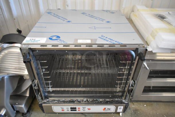 BRAND NEW SCRATCH AND DENT! Cooking Performance Group CPG 351COHD3M Stainless Steel Commercial Countertop Electric Digital Countertop 3 Tray Half Size Convection Oven with Steam Injection. See Pictures for Broken Door Glass. 208-240 Volts, 1 Phase. 