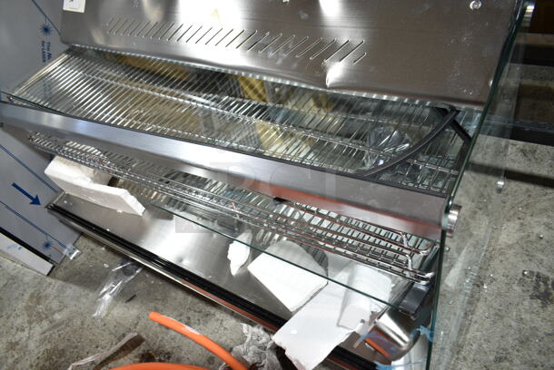 BRAND NEW SCRATCH AND DENT! ServIt 423HDM48SA Stainless Steel Commercial Countertop Full Service Heated Merchandiser Display Case. See Pictures for Damage. 120 Volts, 1 Phase. Tested and Working!
 - Image 6 of 7