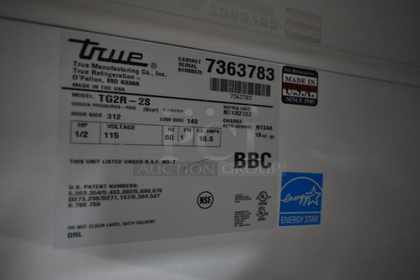 2012 True TG2R-2S ENERGY STAR Stainless Steel Commercial 2 Door Reach In Cooler w/ Poly Coated Racks on Commercial Casters. Doors Need To Be Reattached. 115 Volts, 1 Phase. Tested and Working! - Image 6 of 8