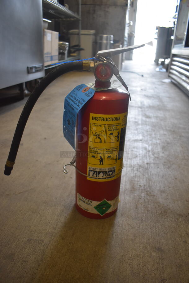 Red Dry Chemical Fire Extinguisher. Buyer Must Pick Up - We Will Not Ship This Item. 