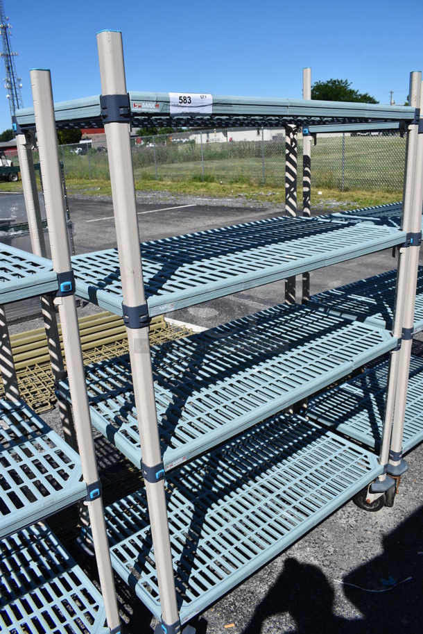Metro Max Poly and Metal 4 Tier Shelving Unit on Commercial Casters. BUYER MUST DISMANTLE. PCI CANNOT DISMANTLE FOR SHIPPING. PLEASE CONSIDER FREIGHT CHARGES. 42x21x67 - Image 1 of 4