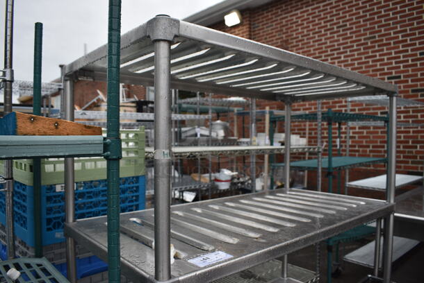 Metal 4 Tier Shelving Unit on Commercial Casters. BUYER MUST DISMANTLE. PCI CANNOT DISMANTLE FOR SHIPPING. PLEASE CONSIDER FREIGHT CHARGES. 48x24x69 - Image 3 of 5