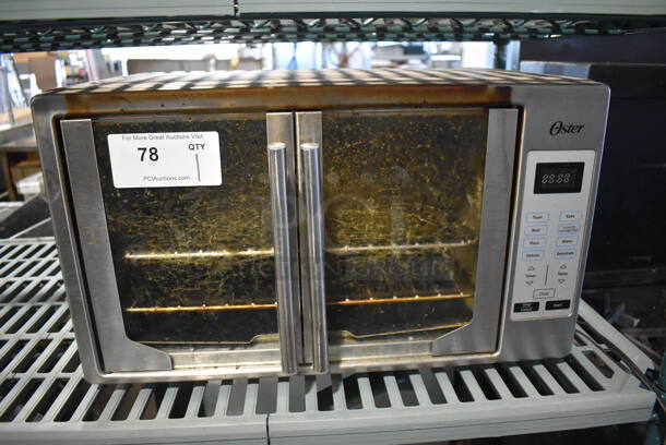 Oster Metal Countertop Toaster Oven. 22x16x13 - Image 1 of 5