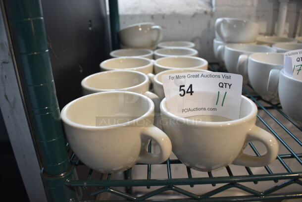 11 White Ceramic Mugs. 5x3.75x2.5. 11 Times Your Bid!