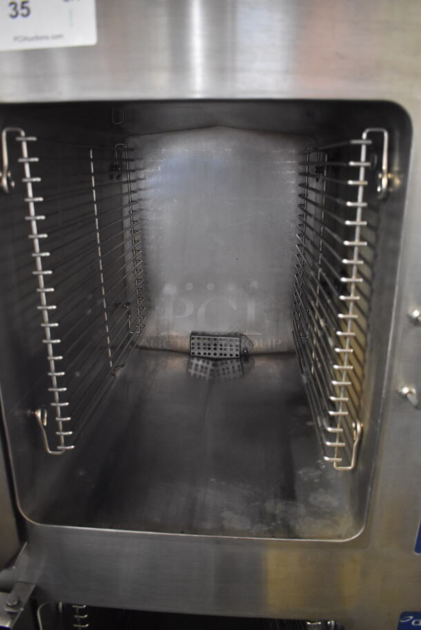 Cleveland 24CEA10 Commercial Stainless Steel Convection Steamer Cabinet With Pan Racks On Galvanized Legs. 480V, 3 Phase.  - Image 4 of 6