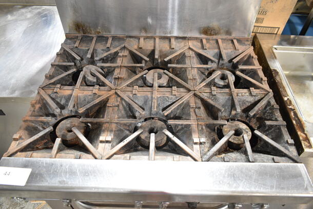 Southbend 4361D Stainless Steel Commercial Natural Gas Powered 6 Burner Range w/ Oven, Over Shelf and Back Splash on Commercial Casters.  - Image 2 of 5