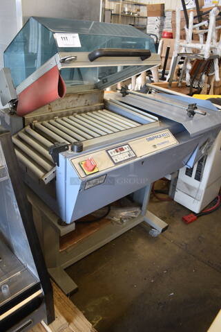 Italdibipack Dibipack 4255 EV Evolution Metal Commercial Floor Style Wrapping Station on Commercial Casters. 220 Volts. 