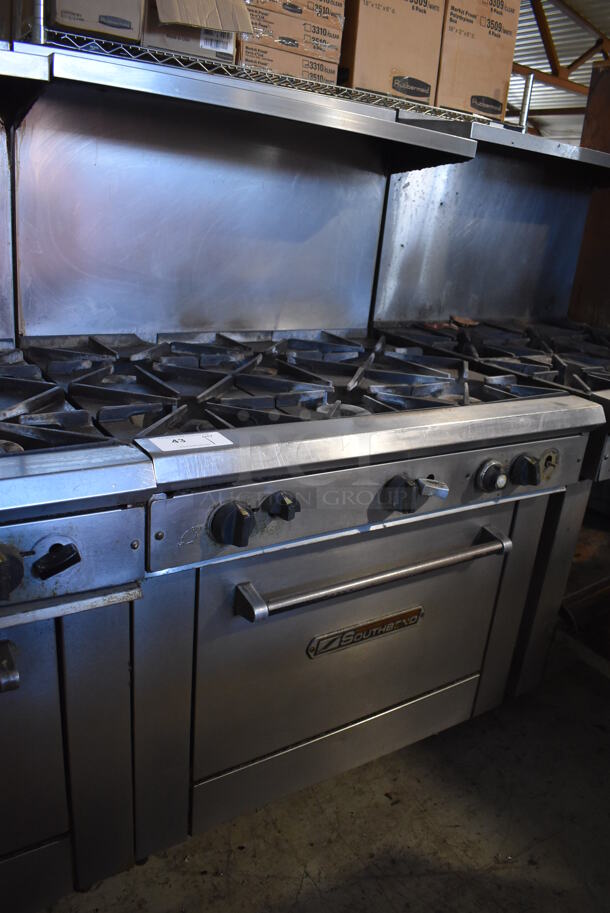 Southbend Stainless Steel Commercial Natural Gas Powered 6 Burner Range w/ Oven, Over Shelf and Back Splash. 36.5x34x59