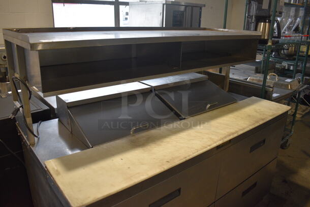 Delfield Stainless Steel Commercial Sandwich Salad Prep Table Bain Marie Mega Top w/ Cutting Board, Over Shelf and 4 Drawers on Commercial Casters. 115 Volts, 1 Phase. 65x33x55. Tested and Powers On But Temps at 49 Degrees - Image 2 of 7