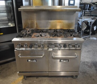 Migali Stainless Steel Commercial Natural Gas Powered 8 Burner Range w/ 2 Ovens, Over Shelf and Back Splash on Commercial Casters. 
