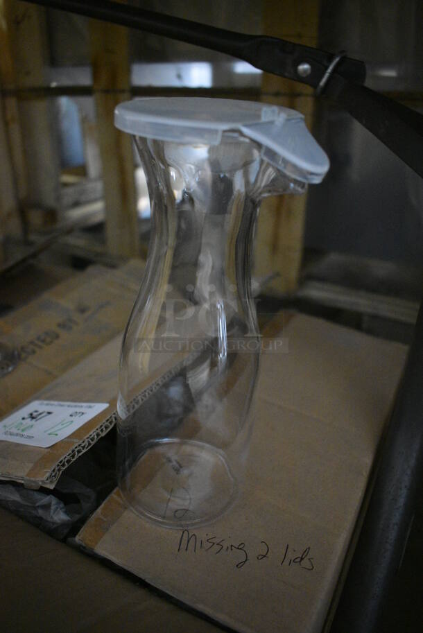ALL ONE MONEY! Lot of 12 BRAND NEW IN BOX! Clear Poly Decanters w/ 10 Lids. 4x4x11 - Image 2 of 3