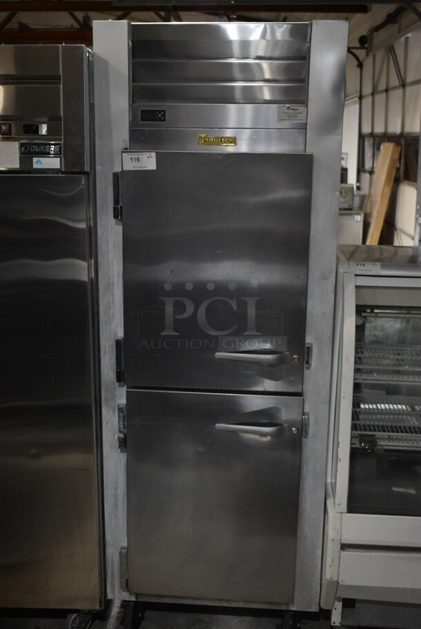 2021 Traulsen G10001 Stainless Steel Commercial 2 Half Size Door Reach In Cooler on Commercial Casters. 115 Volts, 1 Phase. Tested and Powers On But Does Not Get Cold