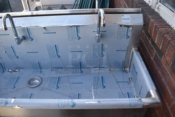 BRAND NEW SCRATCH AND DENT! Advance Tabco FS-FMM-100FV Stainless Steel 16 Gauge Multi Station Hand Sink w/ 5 Faucets, 5 Foot Pedals and Under Shelf. 100x18.5x44 - Image 5 of 6