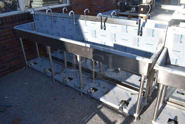 BRAND NEW SCRATCH AND DENT! Advance Tabco FS-FMM-100FV Stainless Steel 16 Gauge Multi Station Hand Sink w/ 5 Faucets, 5 Foot Pedals and Under Shelf. 100x18.5x44 - Image 1 of 8