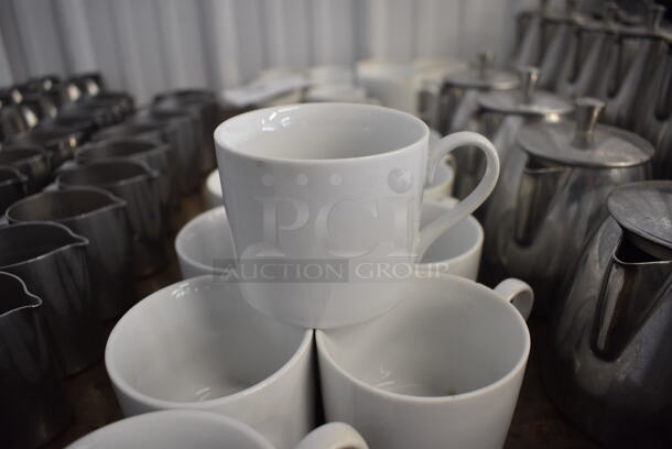 10 White Ceramic Mugs. 4x3x2.5. 10 Times Your Bid!