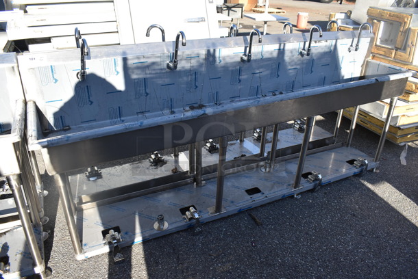 BRAND NEW SCRATCH AND DENT! Advance Tabco FS-FMM-100FV Stainless Steel 16 Gauge Multi Station Hand Sink w/ 5 Faucets, 5 Foot Pedals and Under Shelf. 100x18.5x44 - Image 1 of 7