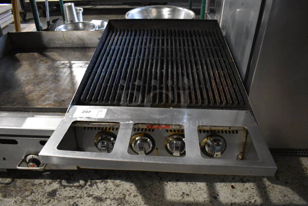 Star 8124RRBB Stainless Steel Commercial Countertop Natural Gas Powered Charbroiler Grill. 24x39x18