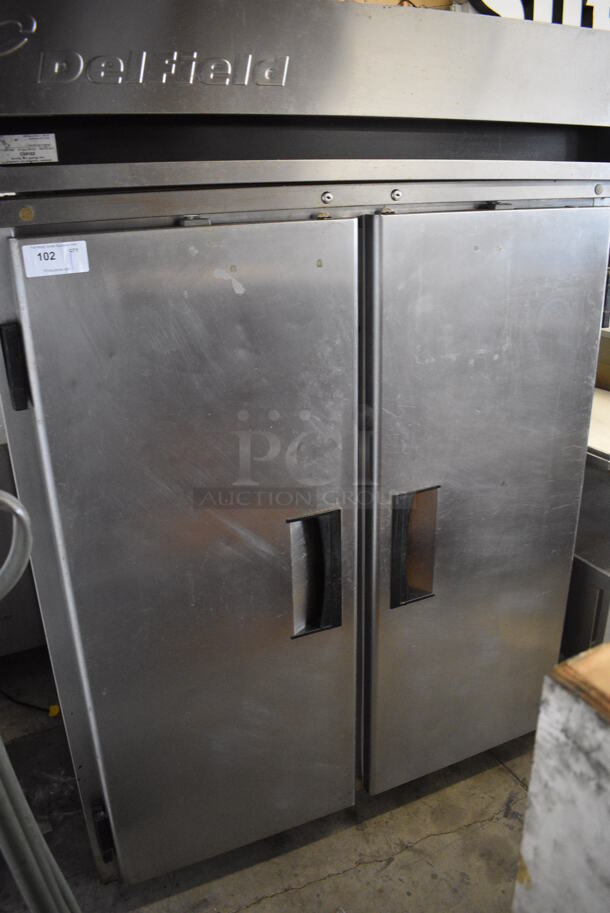 Delfield Model MRR2-S Stainless Steel Commercial 2 Door Reach In Cooler w/ Poly Coated Racks on Commercial Casters. 115 Volts, 1 Phase. 56x34x79. Tested and Powers On But Temps at 51 Degrees - Image 3 of 6